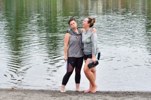 Girls having fun! Two girlfriends enjoying a day of standup paddleboarding in Woodland Washington