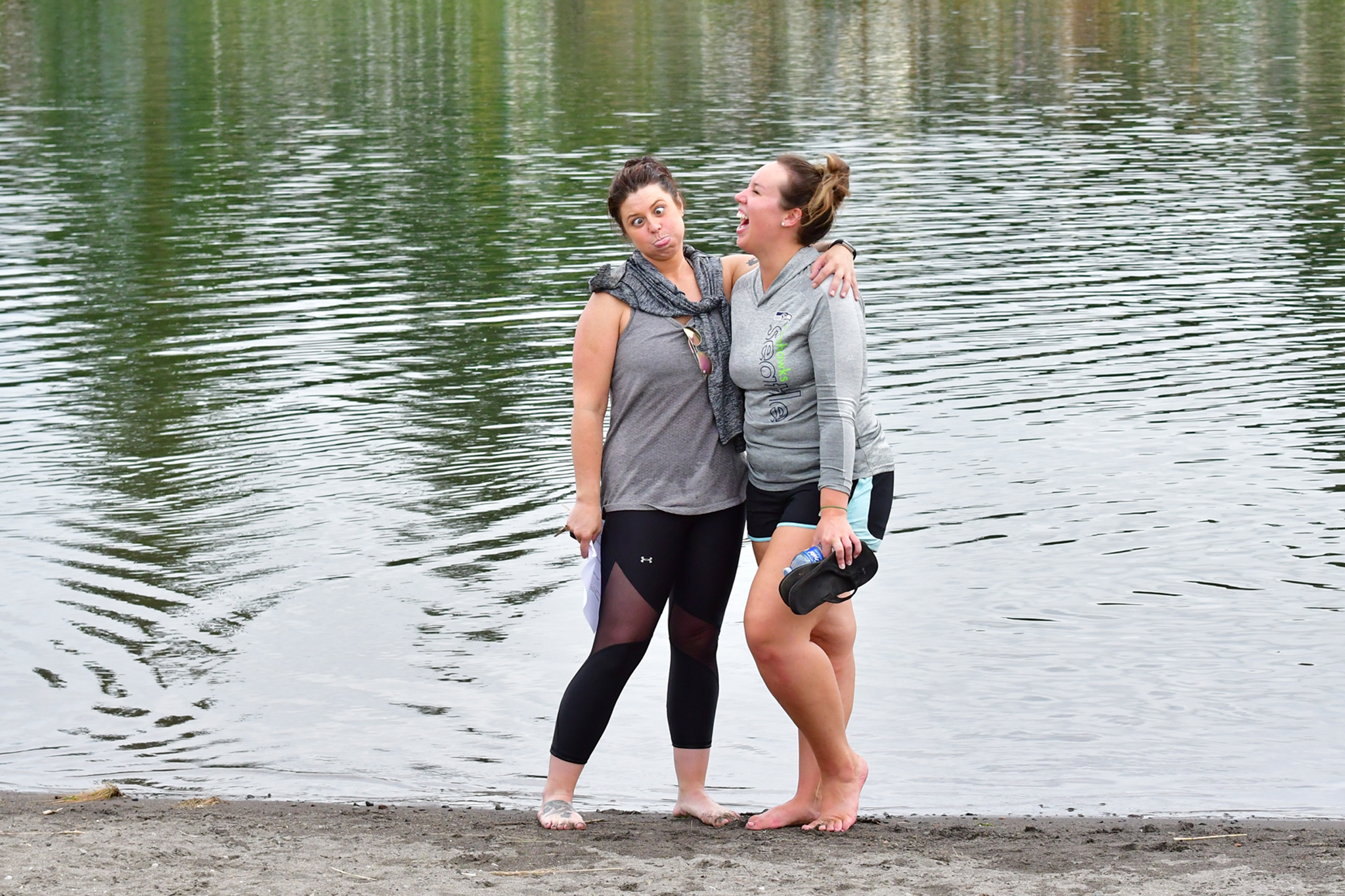 Girls having fun! Two girlfriends enjoying a day of standup paddleboarding in Woodland Washington